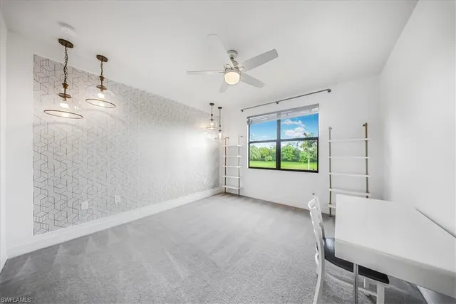 a view of a hallway with entryway