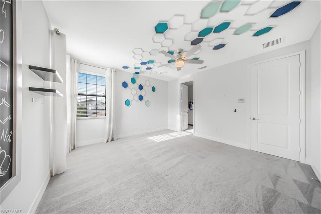 4036 Nova Lane Naples, FL 34119 - Photo 31 of 50 a view of an empty room with a window