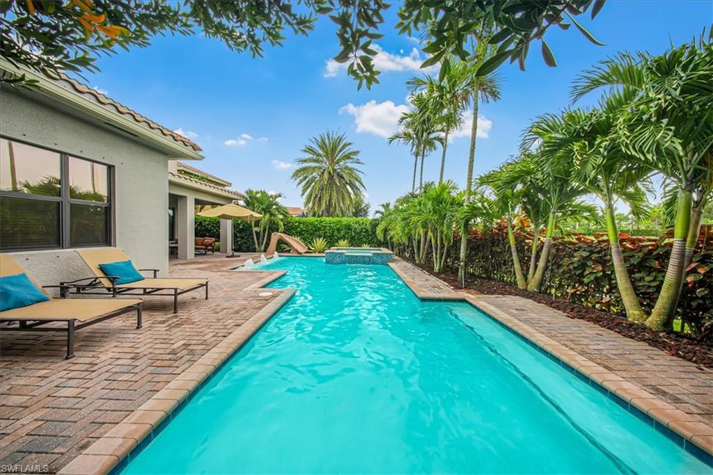 4036 Nova Lane Naples, FL 34119 - Photo 37 of 50 a view of a patio with chairs and plants