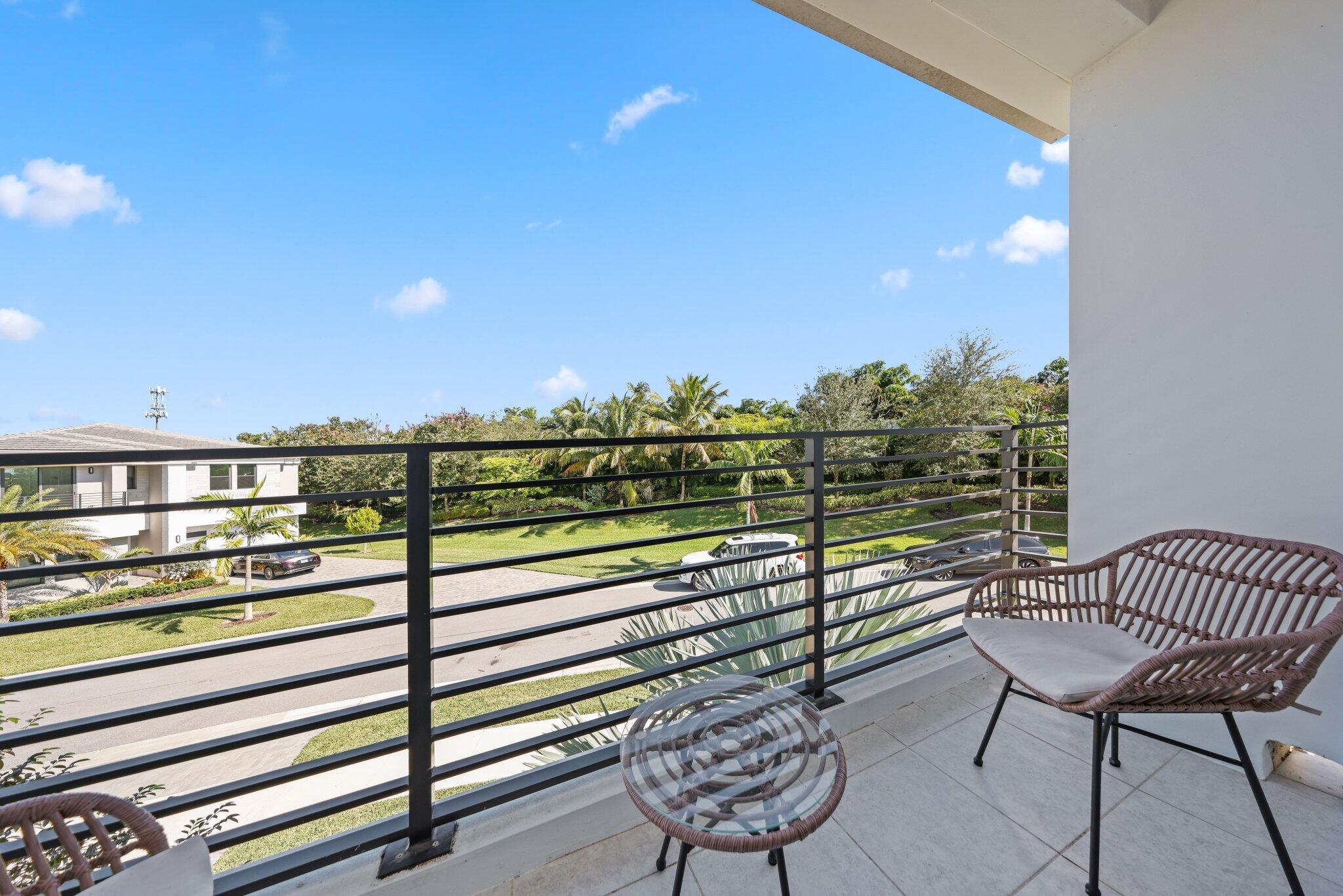 8116 Laurel Falls Drive Boca Raton, FL 33496 - Photo 45 of 81 a view of a chairs and table on the terrace