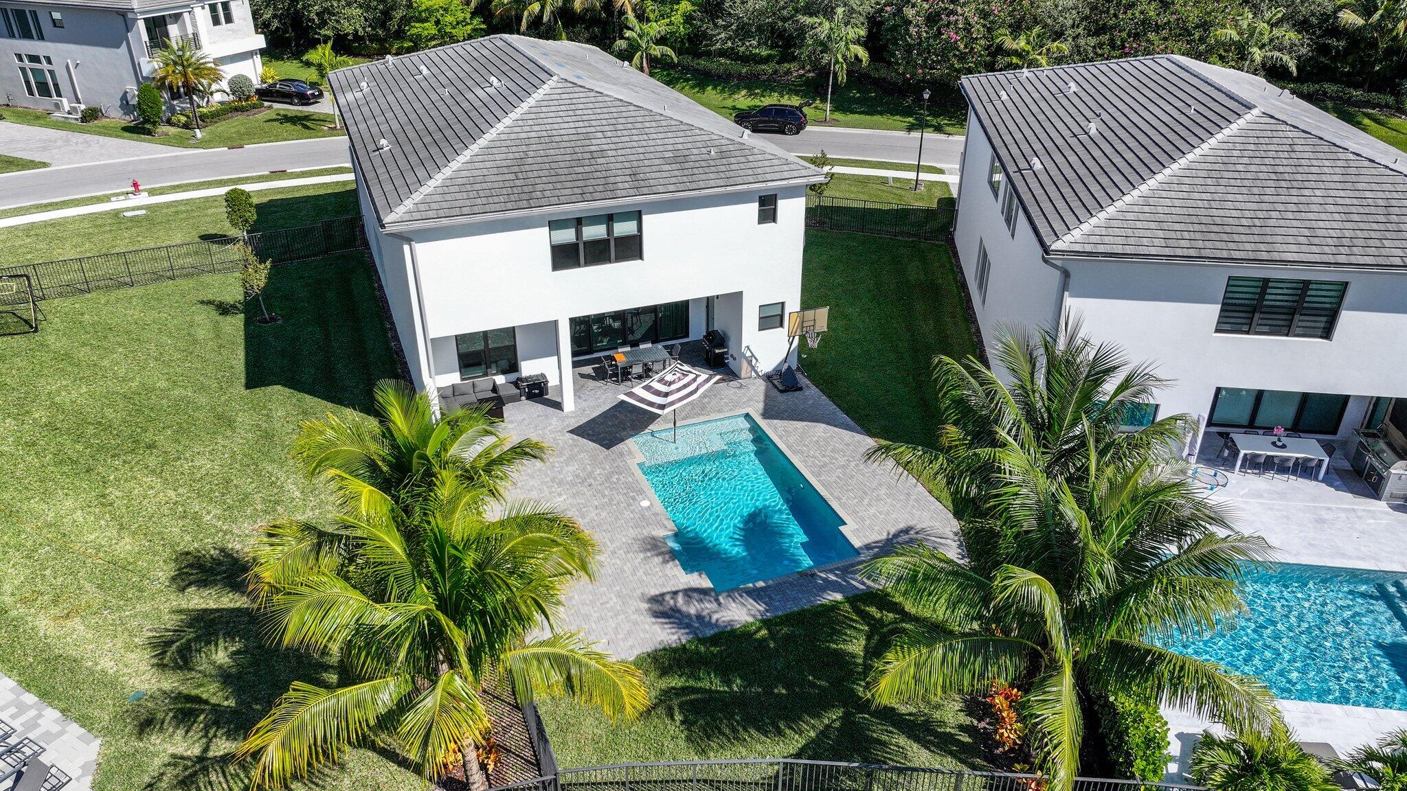 8116 Laurel Falls Drive Boca Raton, FL 33496 - Photo 59 of 81 a aerial view of a house with yard and sitting area