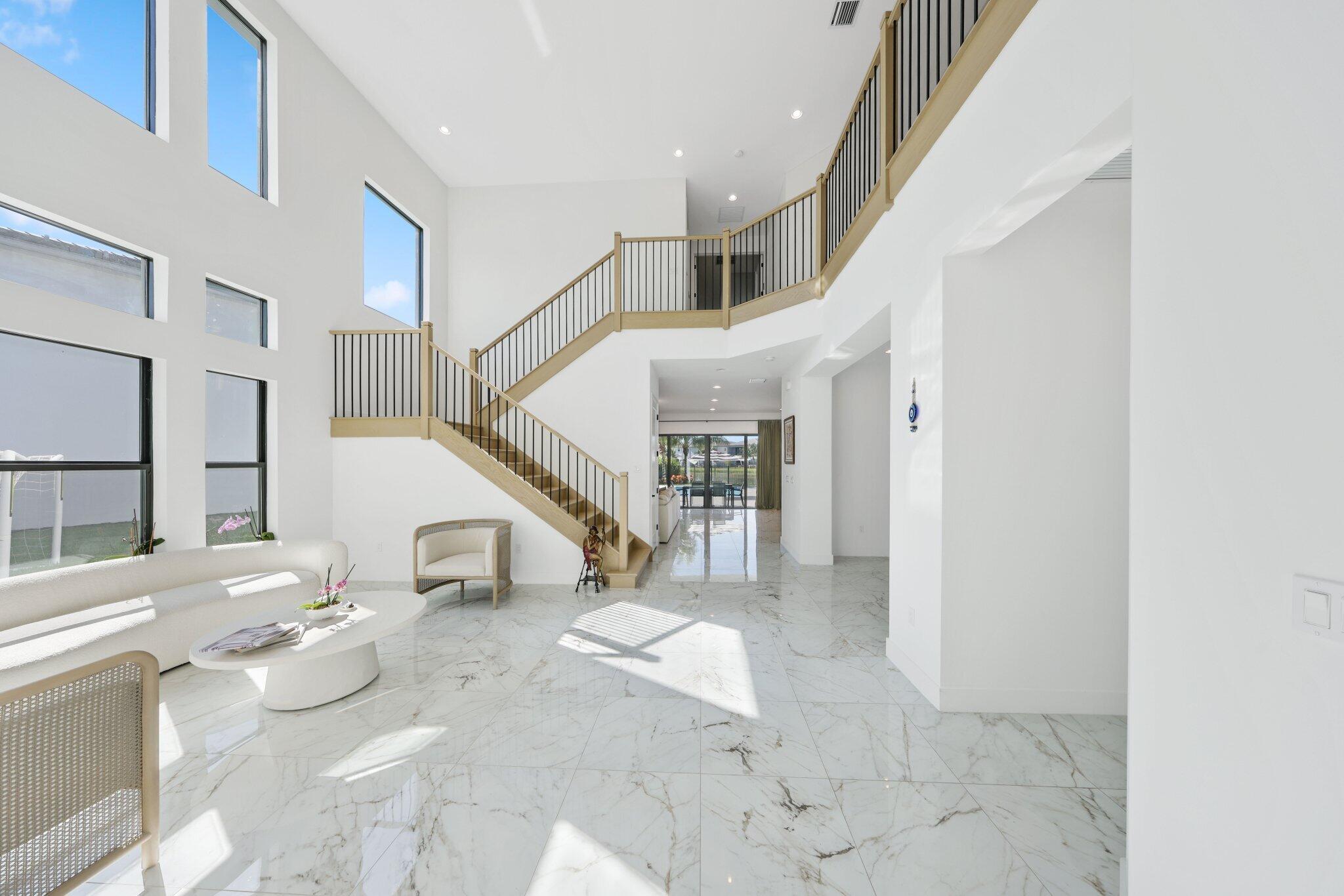 8116 Laurel Falls Drive Boca Raton, FL 33496 - Photo 6 of 81 a view of entryway and hall