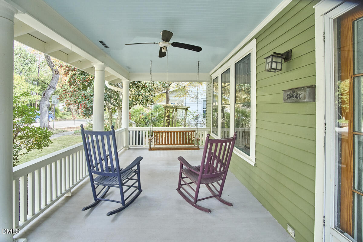 909 West Lenoir Street Raleigh, NC 27603 - Photo 3 of 8 a view of a porch with furniture and a yard