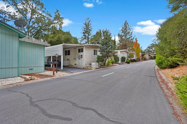 a view of a street with a house