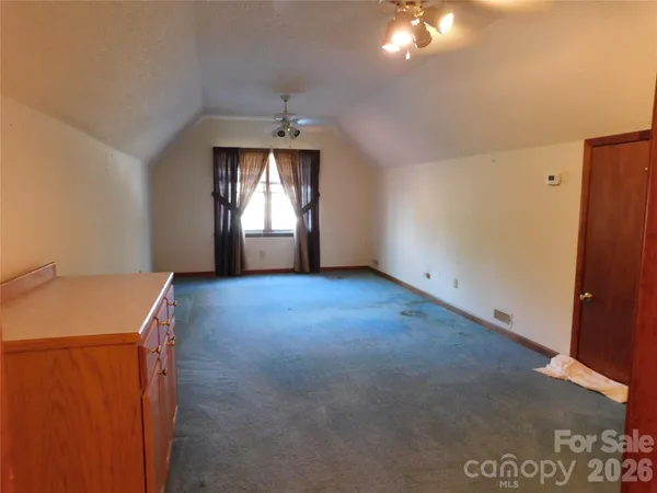 an entryway with a rug