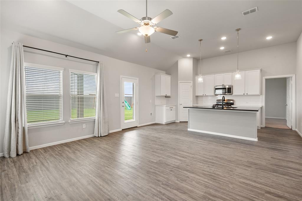6910 Prairieside Trail Venus, TX 76084 - Photo 11 of 40 Living & Dining areas are also open to the kitchen!