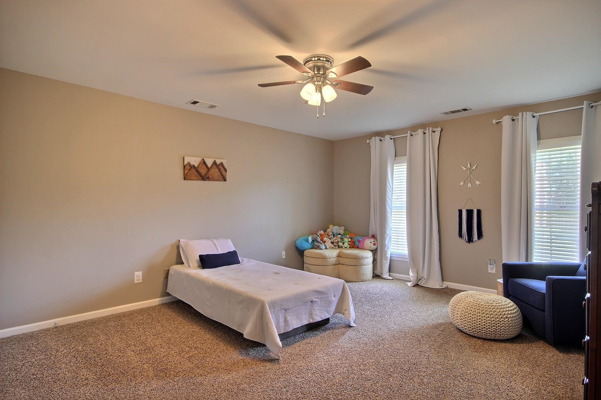 705 Cotham Drive Collierville, TN 38017 - Photo 20 of 25 a bedroom with a bed and window