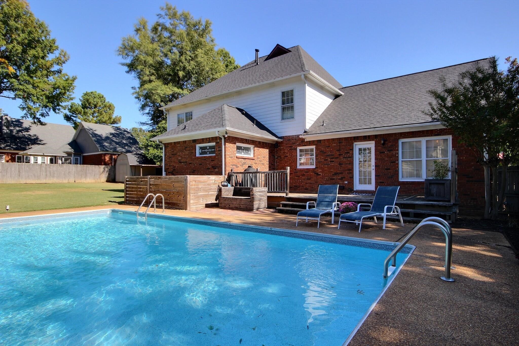 705 Cotham Drive Collierville, TN 38017 - Photo 23 of 25 a view of a house with swimming pool and sitting area