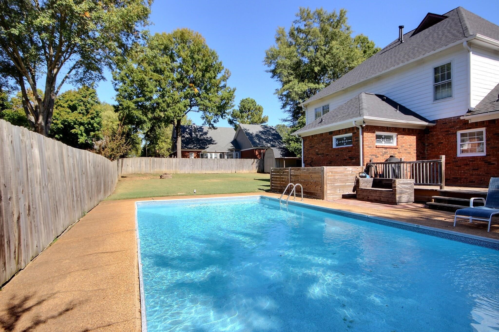 705 Cotham Drive Collierville, TN 38017 - Photo 24 of 25 a view of a swimming pool with a patio