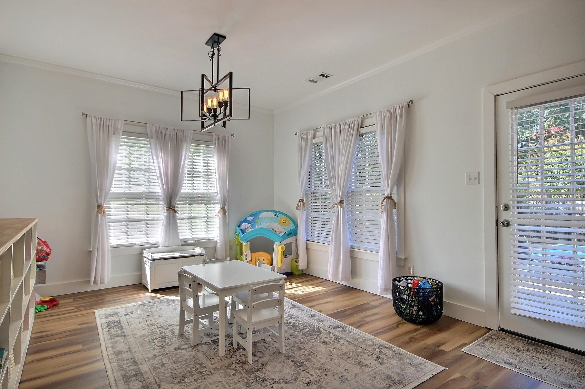 705 Cotham Drive Collierville, TN 38017 - Photo 5 of 25 a living room with furniture and a window