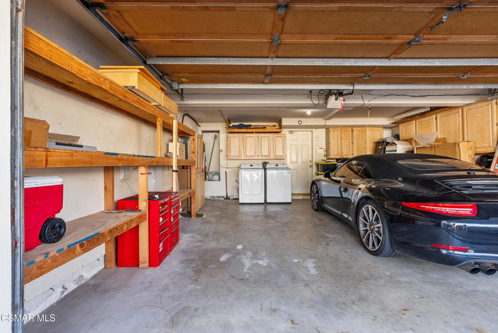 5138 Outrigger Way, Unit 1 Oxnard, CA 93035 - Photo 17 of 20 a view of parking garage with cars