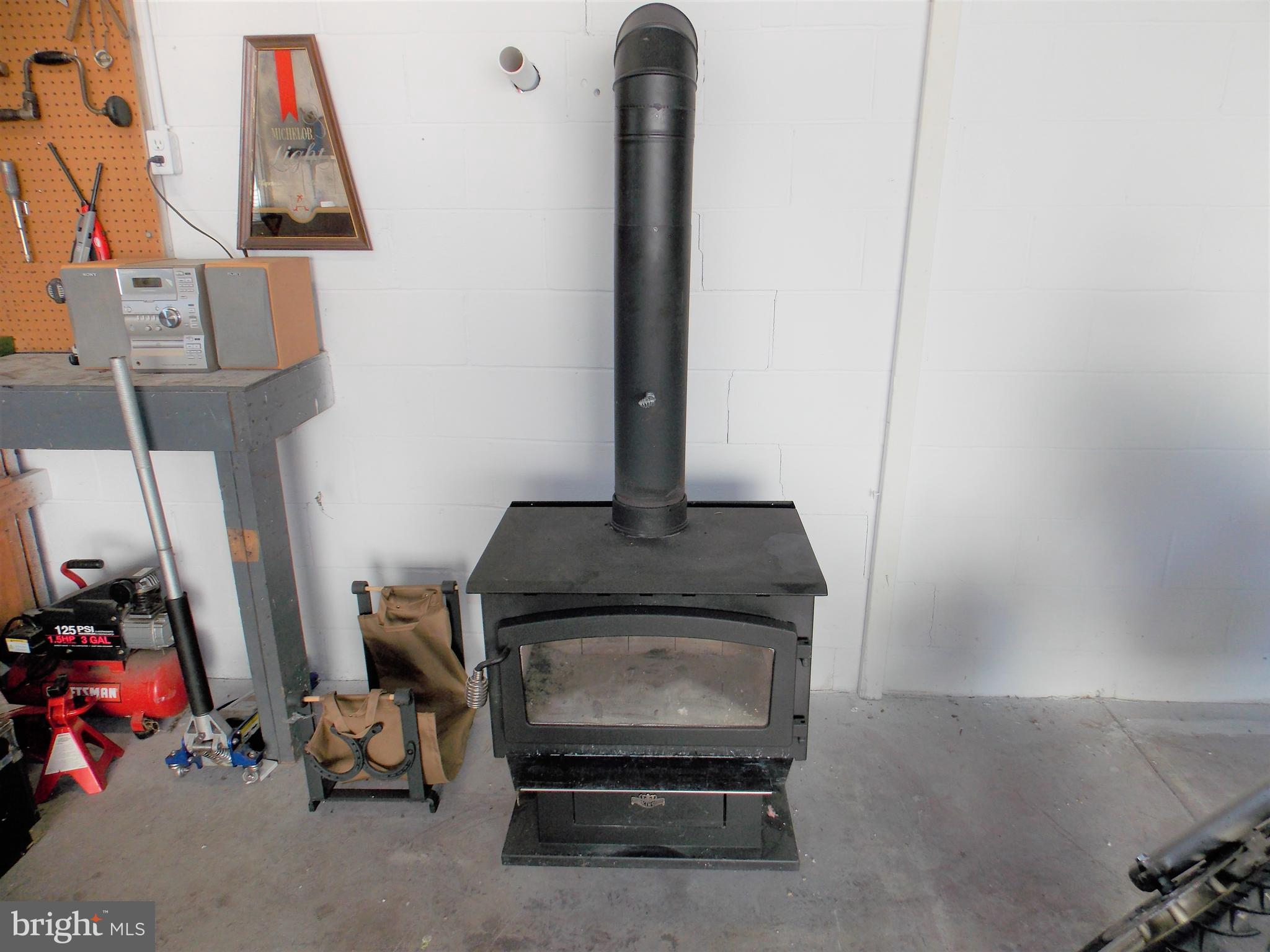 2932 Mt Hope Home Road Manheim, PA 17545 - Photo 40 of 43 wood stove in detached 2 car garage
