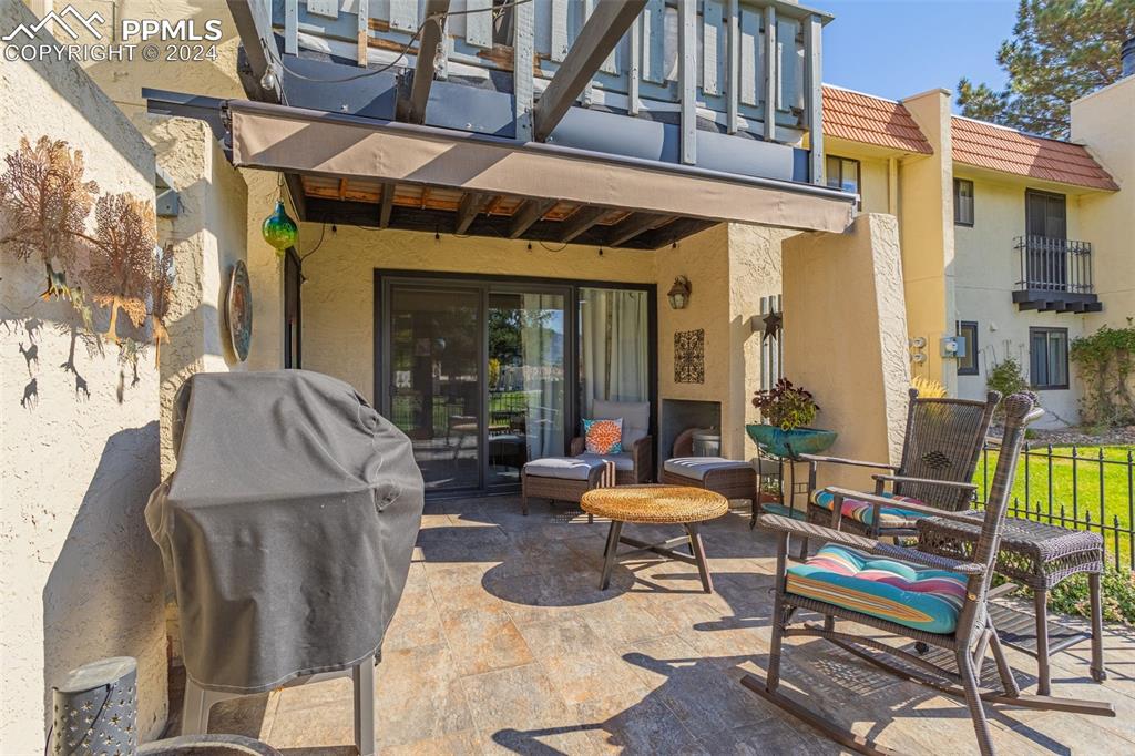 1098 Fontmore Road, Unit B Colorado Springs, CO 80904 - Photo 20 of 27 View of patio featuring a balcony and a grill