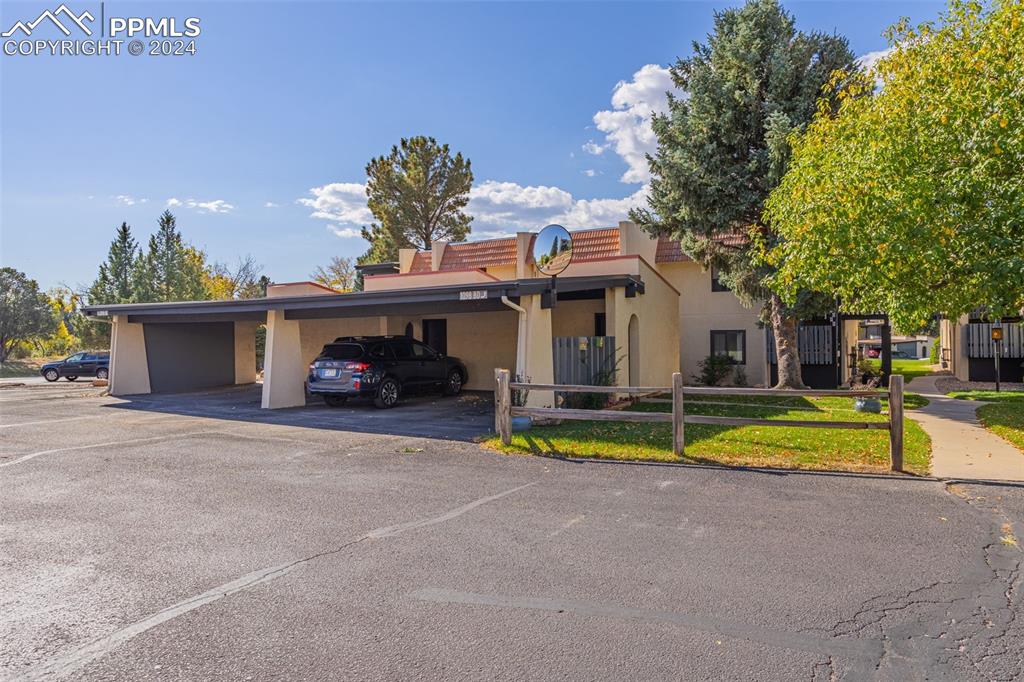 1098 Fontmore Road, Unit B Colorado Springs, CO 80904 - Photo 25 of 27 View of front of home with a front yard