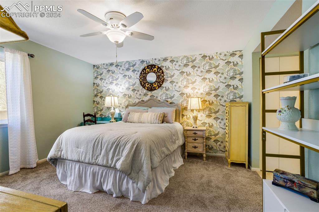 1098 Fontmore Road, Unit B Colorado Springs, CO 80904 - Photo 10 of 27 Carpeted bedroom with ceiling fan