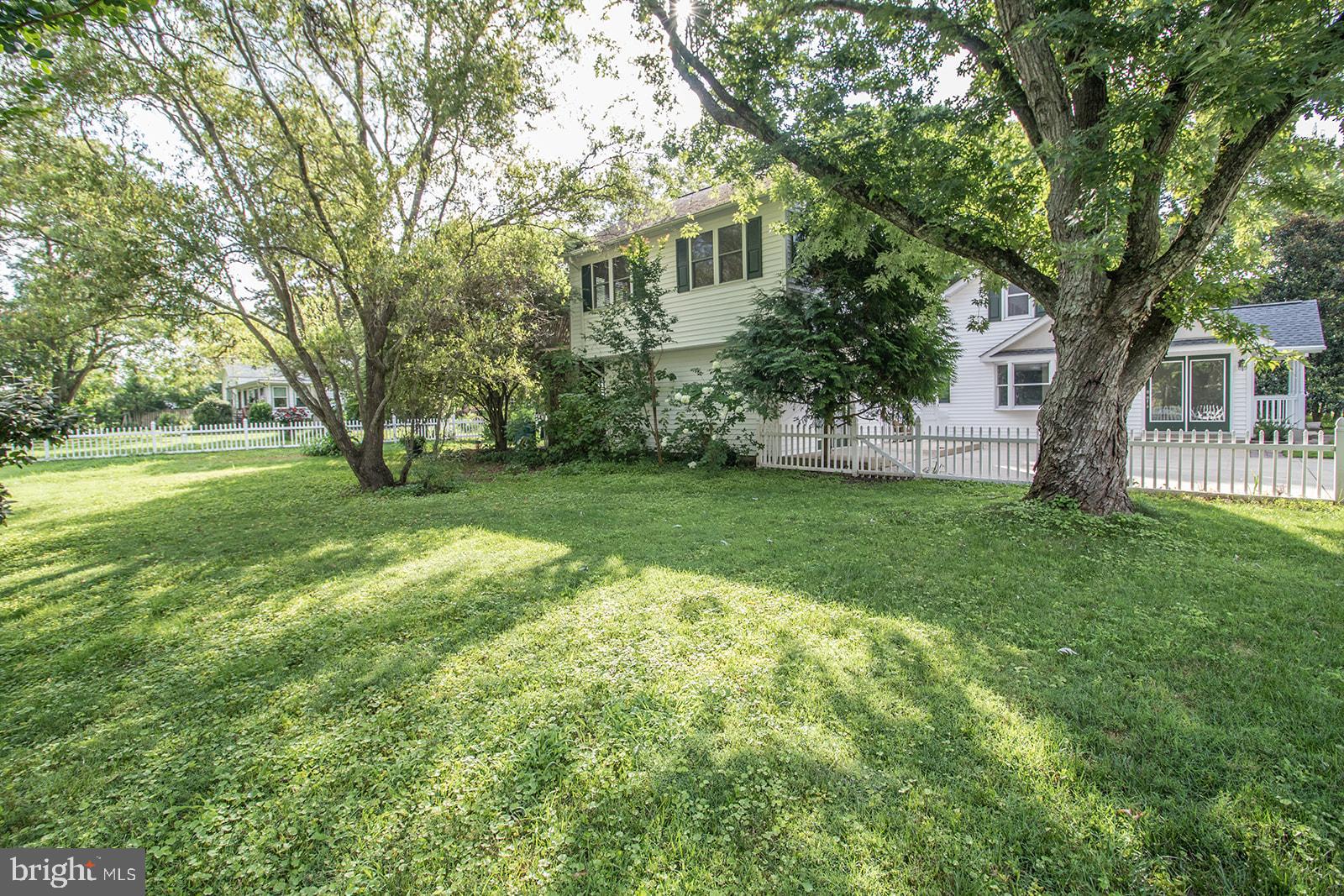 45044 Deagles Boatyard Road Tall Timbers, MD 20690 - Photo 14 of 64 a view of a house with a backyard