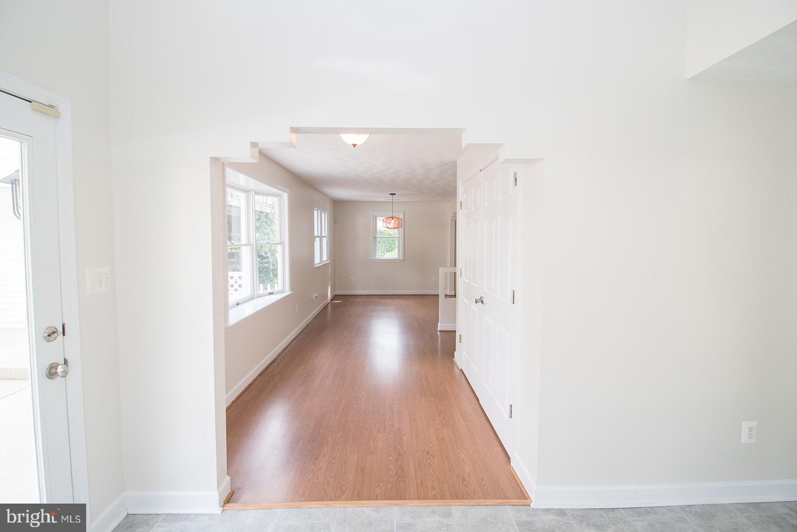 45044 Deagles Boatyard Road Tall Timbers, MD 20690 - Photo 18 of 64 a view of a hallway with wooden floor