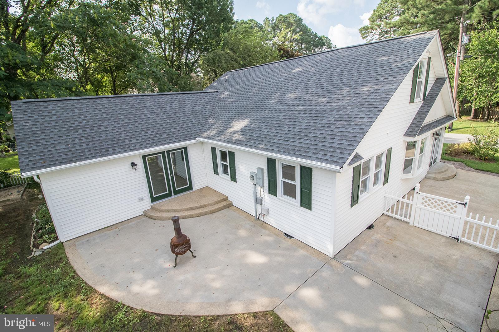 45044 Deagles Boatyard Road Tall Timbers, MD 20690 - Photo 5 of 64 a aerial view of a house with a yard balcony