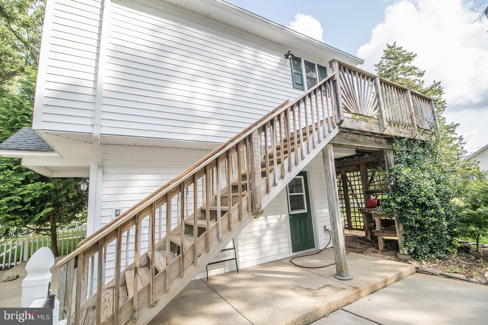 45044 Deagles Boatyard Road Tall Timbers, MD 20690 - Photo 9 of 64 a view of entryway with staircase