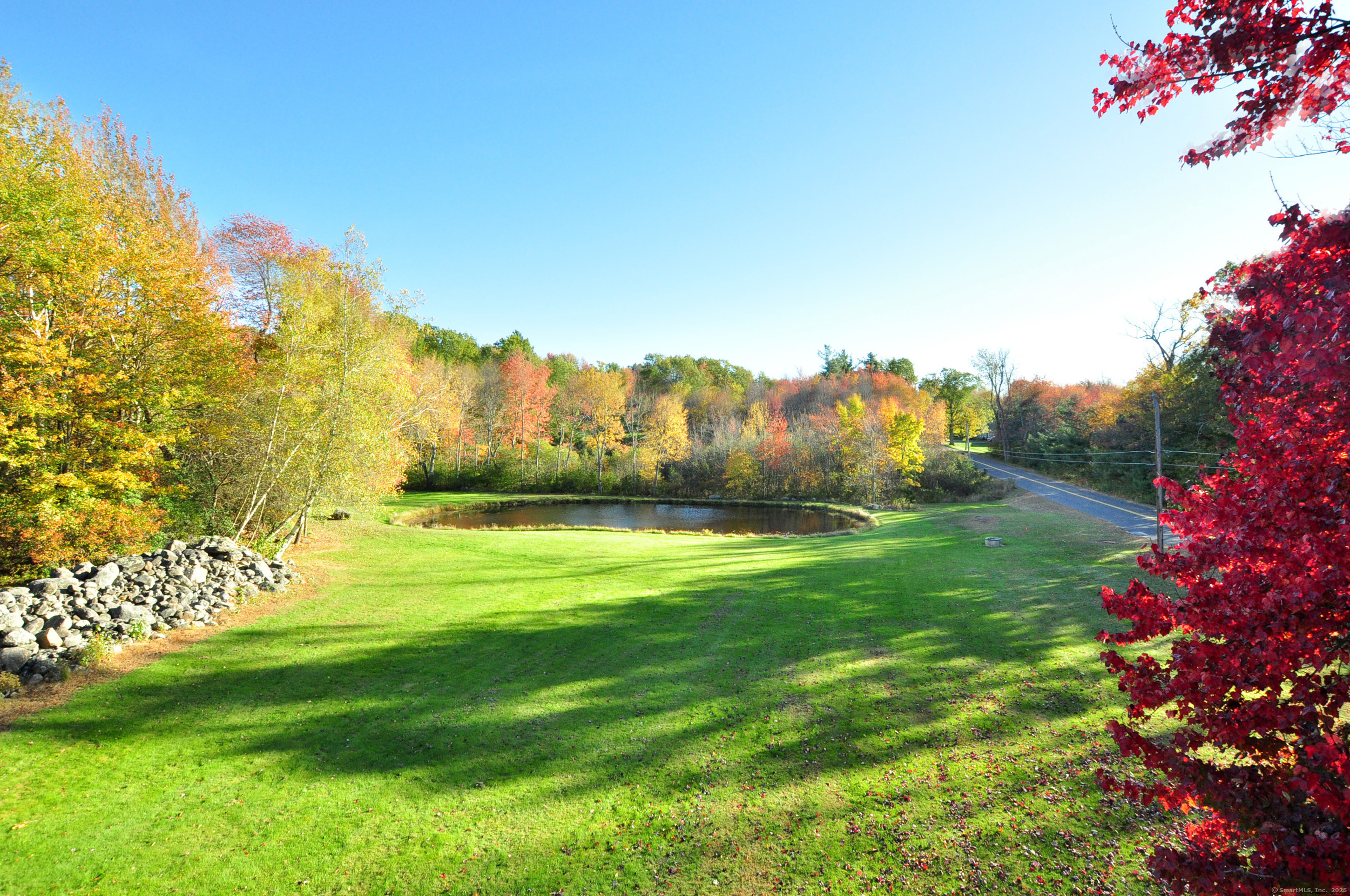 86 Case Street Granby, CT 06090 - Photo 2 of 25 a view of a yard