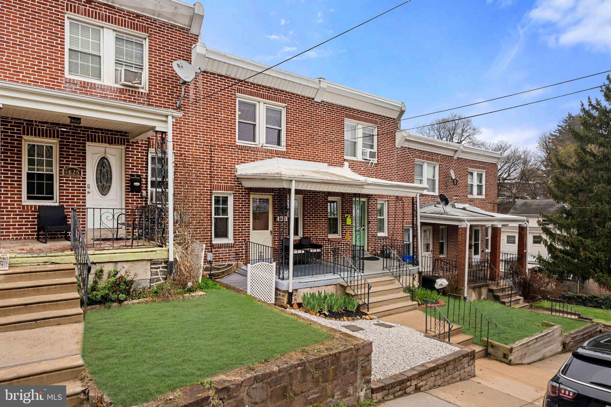 4823 Tibben Street Philadelphia, PA 19128 - Photo 2 of 28 a front view of a house with garden and porch