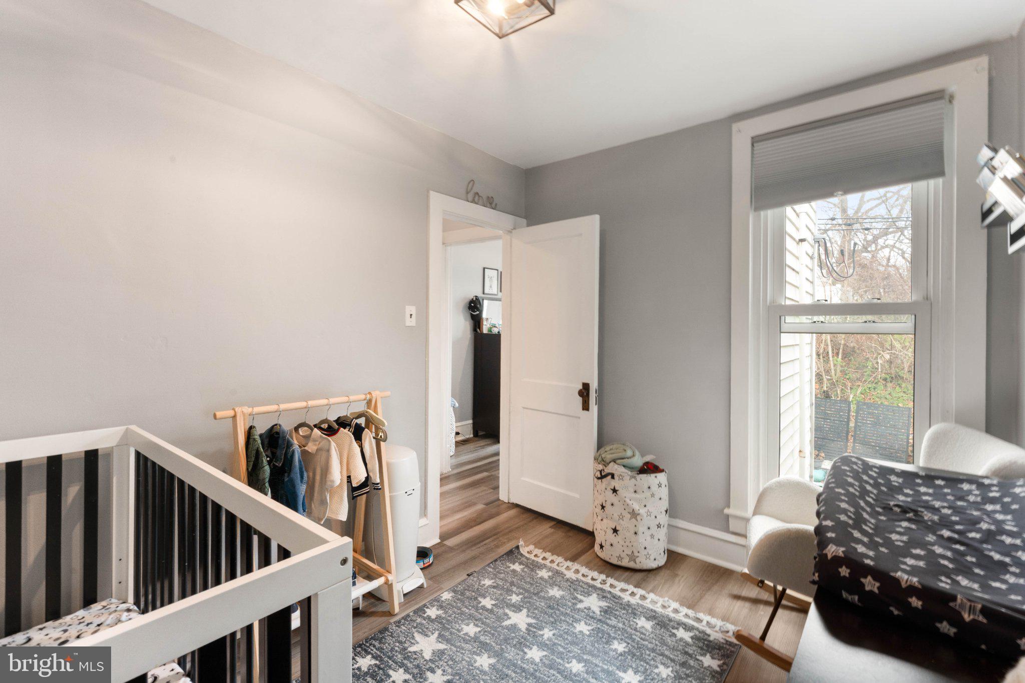 4823 Tibben Street Philadelphia, PA 19128 - Photo 21 of 28 a bedroom with furniture and a window