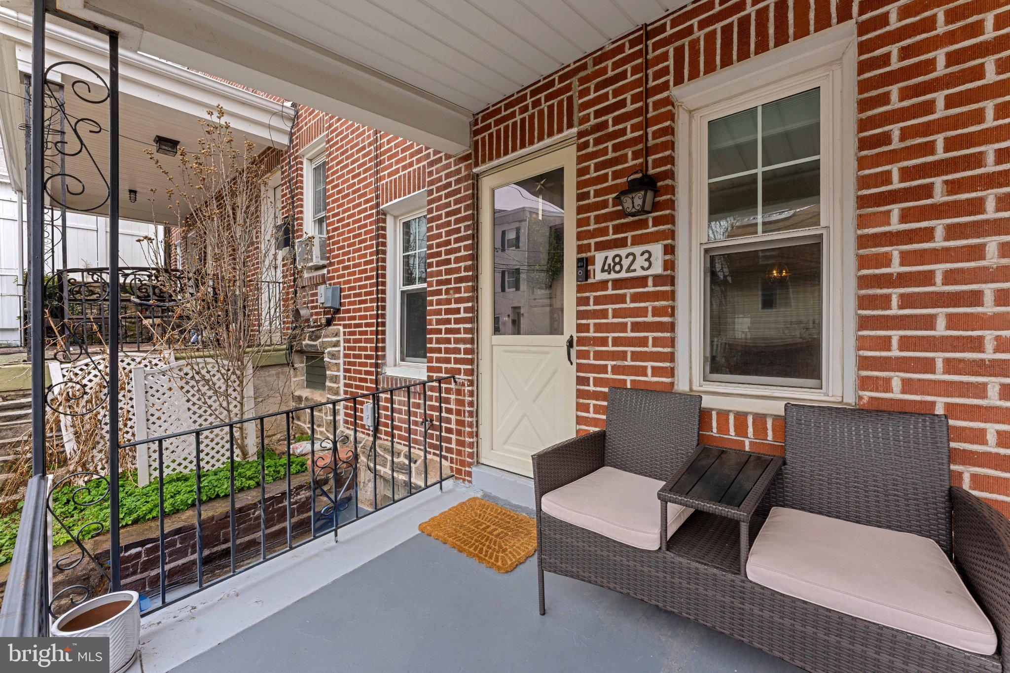 4823 Tibben Street Philadelphia, PA 19128 - Photo 3 of 28 a building outdoor space with patio furniture