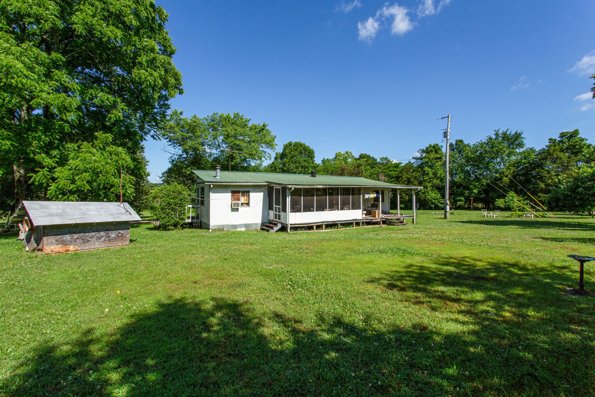 2837 South Commerce Road Watertown, TN 37184 - Photo 3 of 9 a view of a house with a big yard