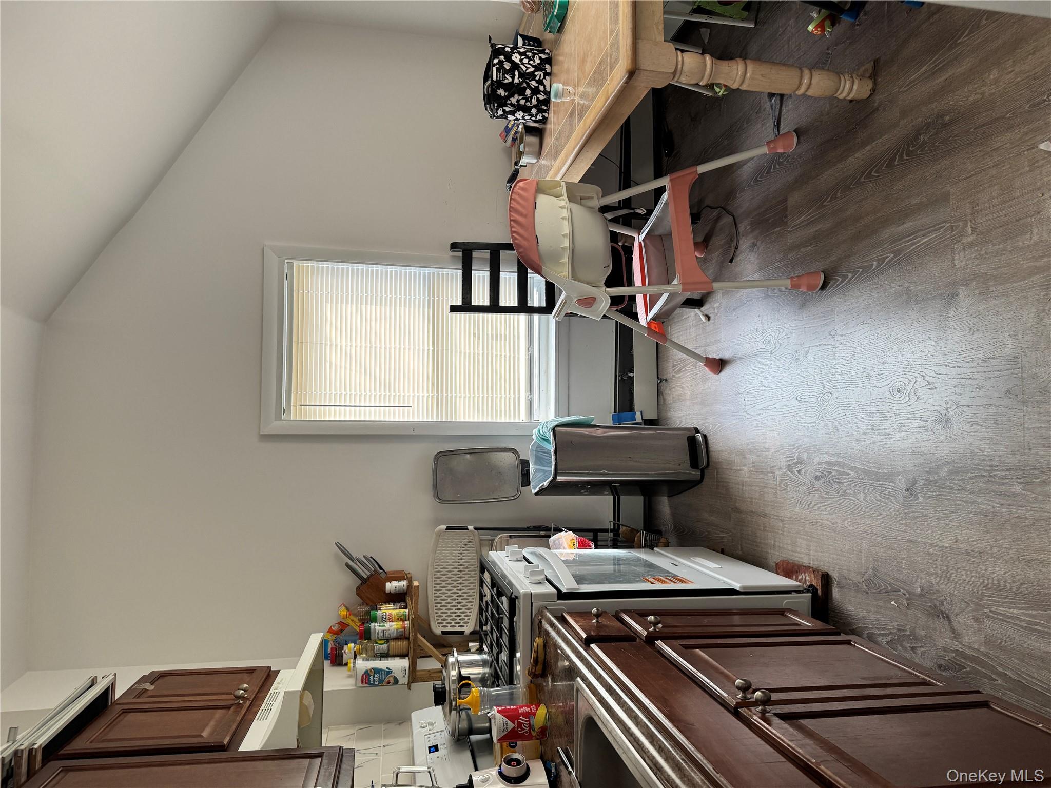 58 State Street Ossining, NY 10562 - Photo 6 of 11 a view of a kitchen with a sink and a stove top oven