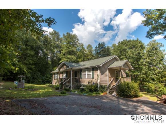 978 Cove Road Rutherfordton, NC 28139 - Photo 1 of 24 a front view of a house with a yard