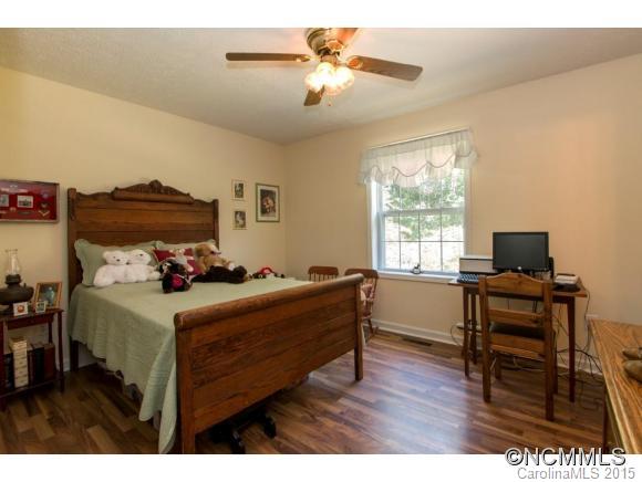 978 Cove Road Rutherfordton, NC 28139 - Photo 9 of 24 a bed room with a bed and a window