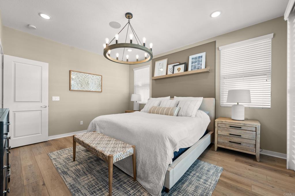 13085 Olympus Circle, Unit 1 Poway, CA 92064 - Photo 17 of 44 a bedroom with bed and a window
