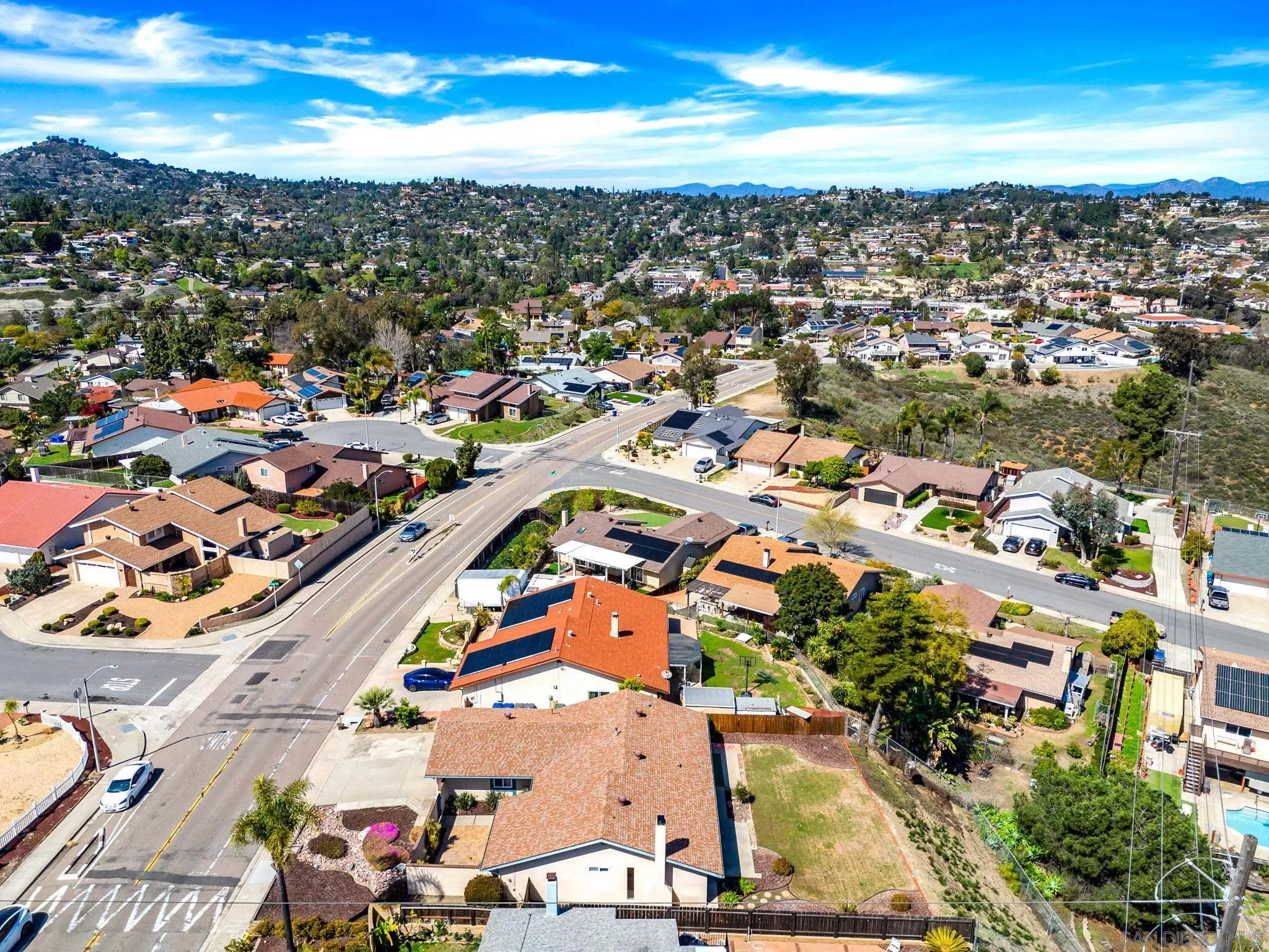11004 Del Rio Road Spring Valley, CA 91978 - Photo 51 of 51 an aerial view of a city with lots of residential buildings ocean and mountain view in back