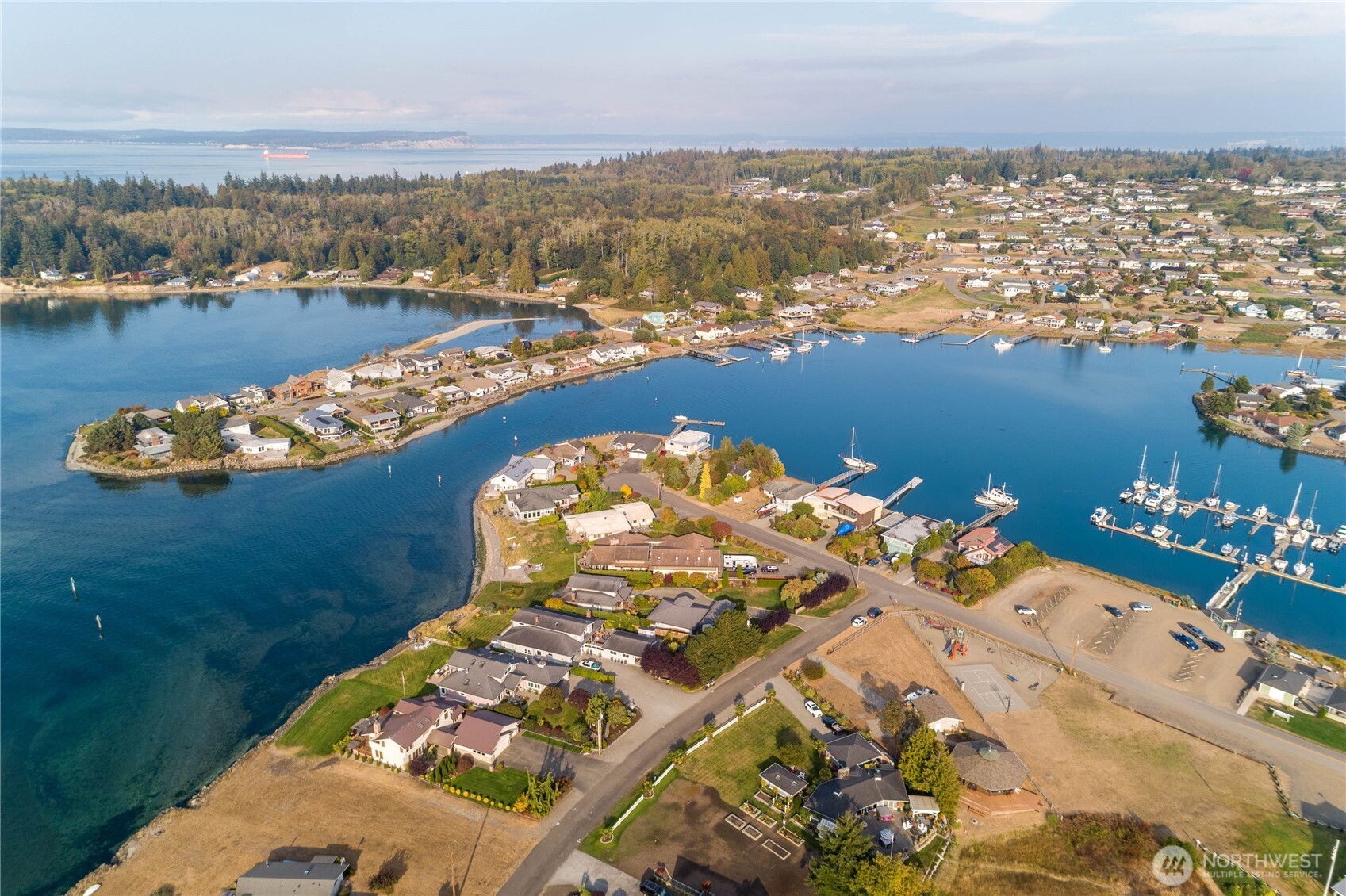 37692 Buck Road Northeast Hansville, WA 98340 - Photo 5 of 9 an aerial view of a house with a ocean view