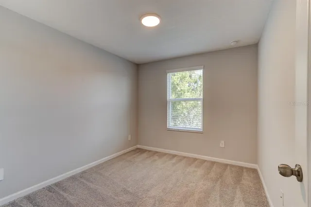 an empty room with a window