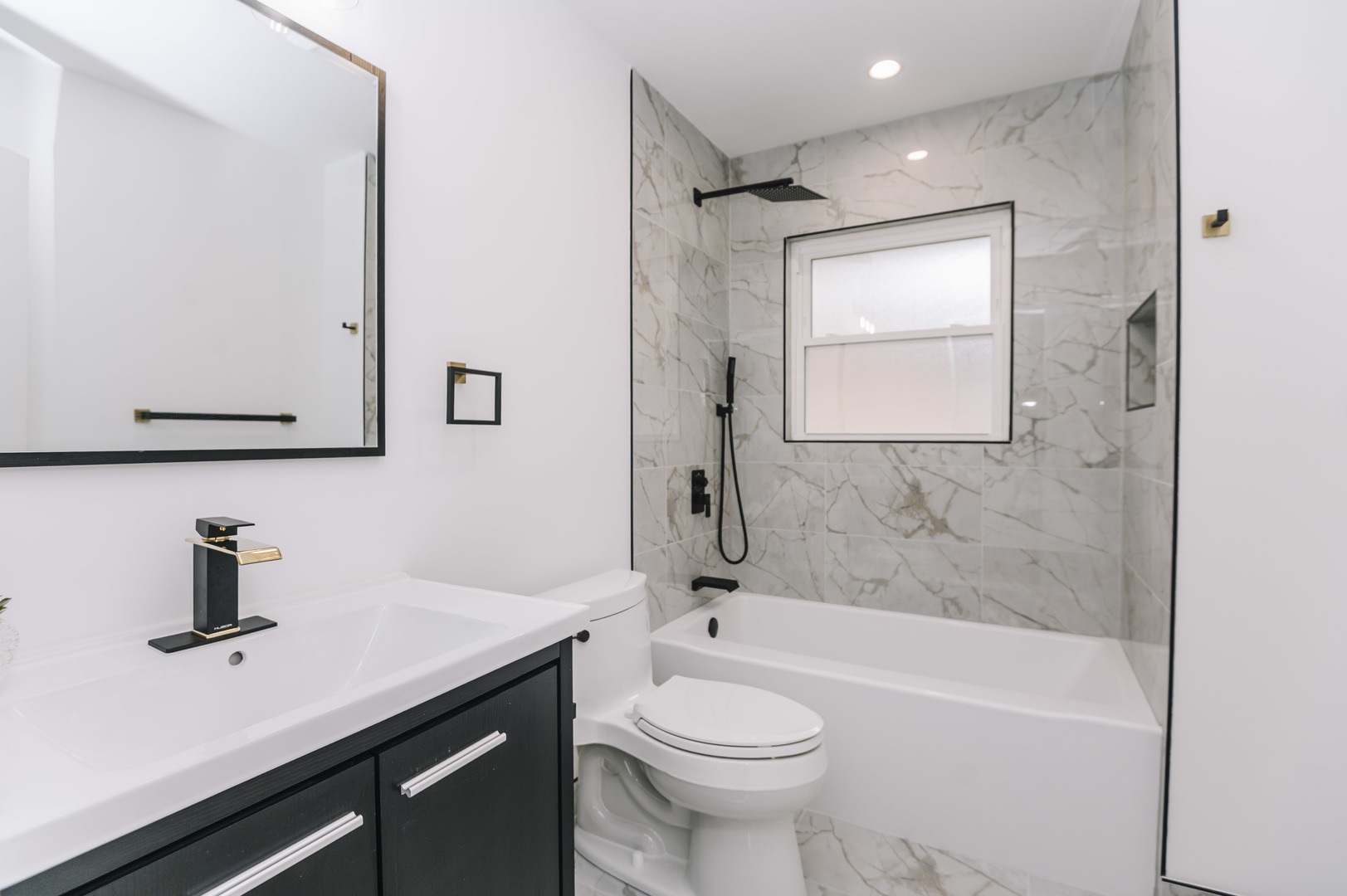 6800 97th Street Oak Lawn, IL 60453 - Photo 15 of 18 a bathroom with a sink a toilet and shower