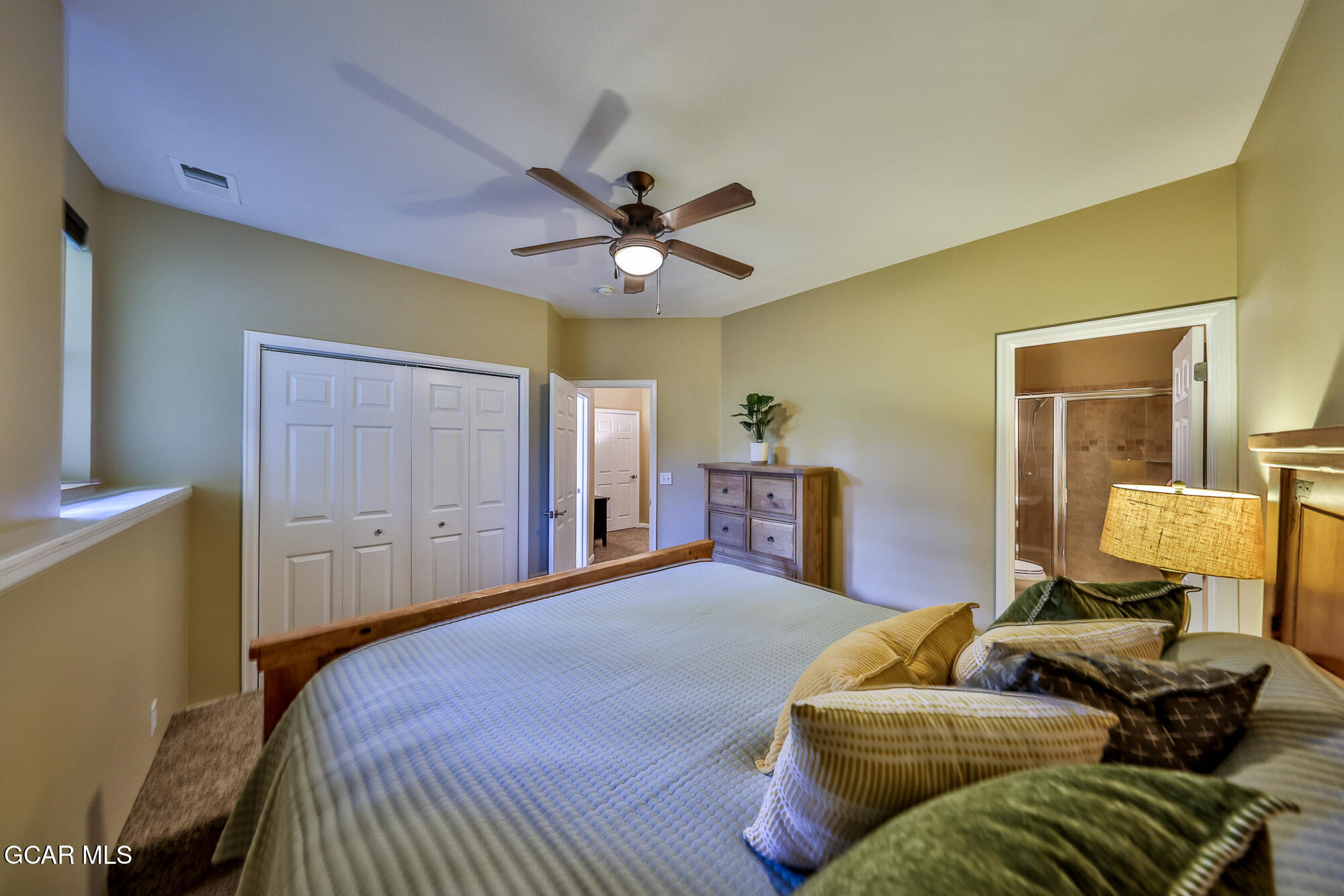 175 Gcr 8340, Unit 1 Fraser, CO 80442 - Photo 15 of 28 a bedroom with furniture and a ceiling fan