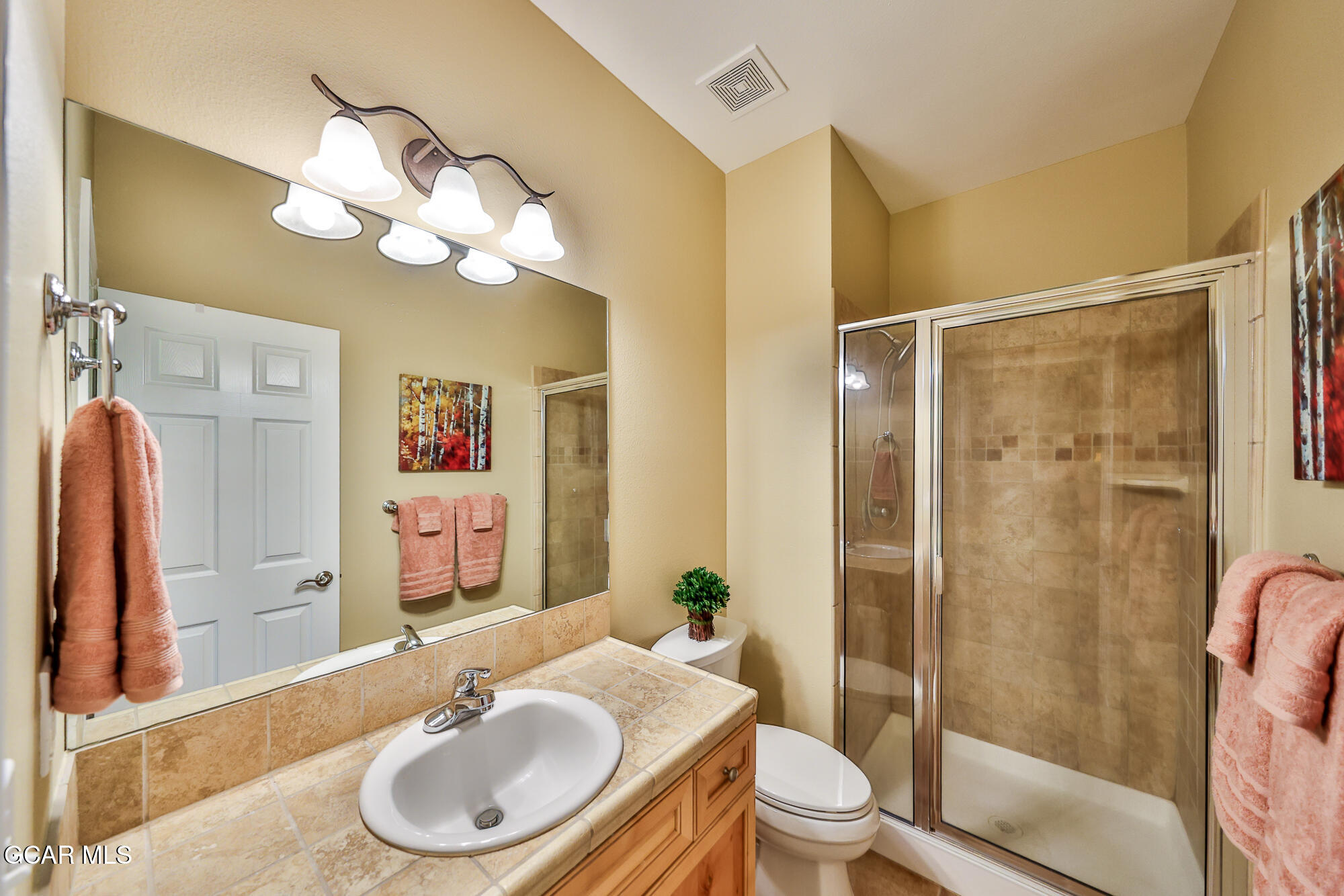 175 Gcr 8340, Unit 1 Fraser, CO 80442 - Photo 16 of 28 a bathroom with a sink a toilet and a mirror