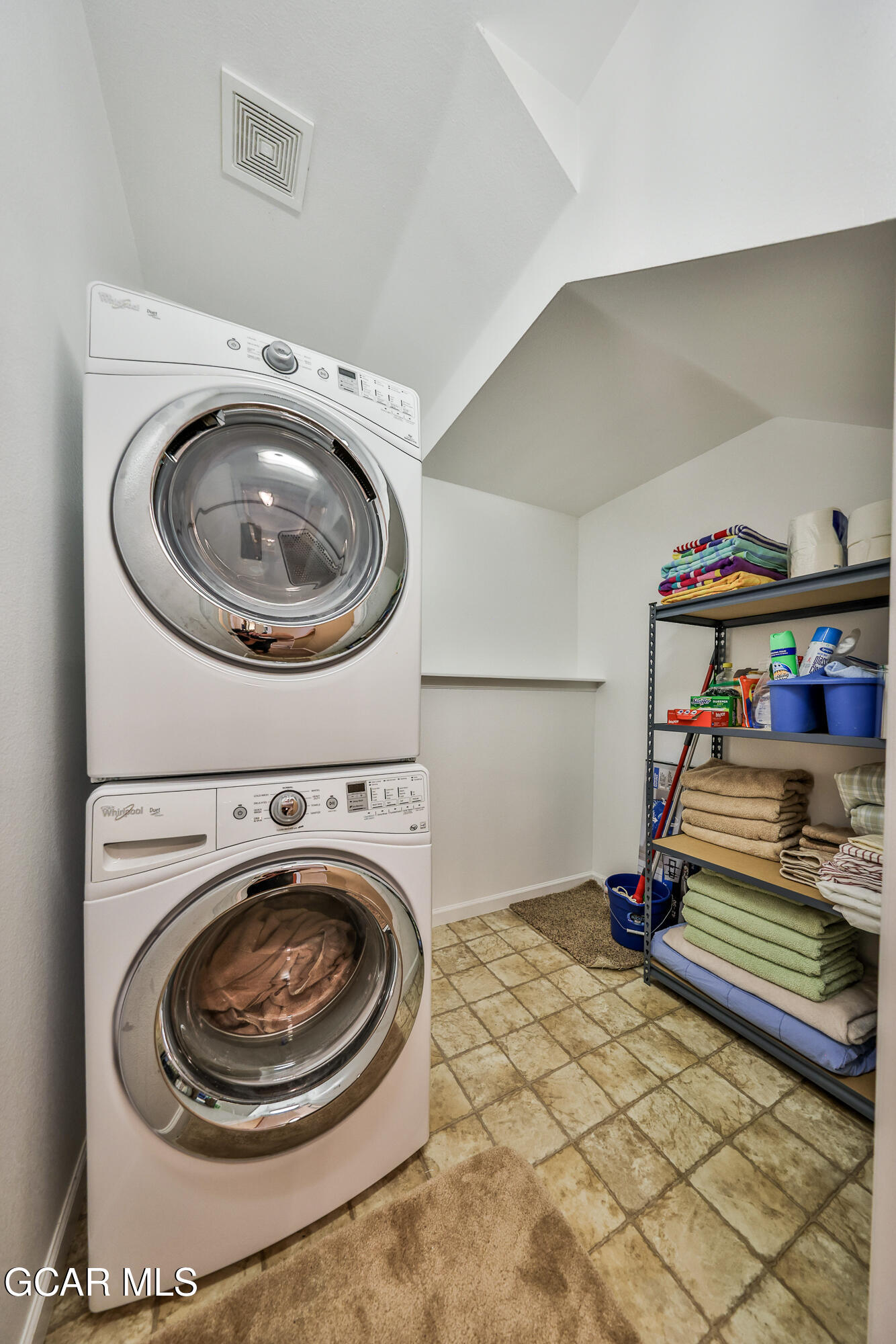 175 Gcr 8340, Unit 1 Fraser, CO 80442 - Photo 18 of 28 a utility room with dryer and washer