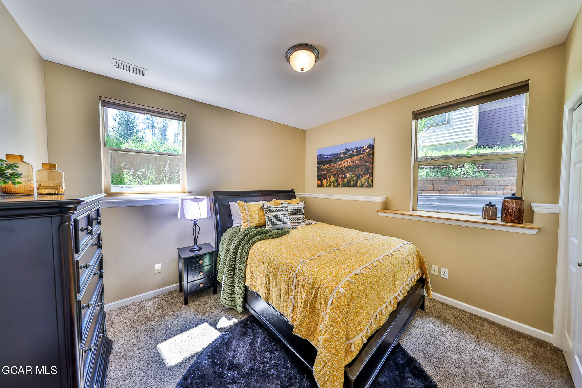 175 Gcr 8340, Unit 1 Fraser, CO 80442 - Photo 19 of 28 a bedroom with a bed and a window