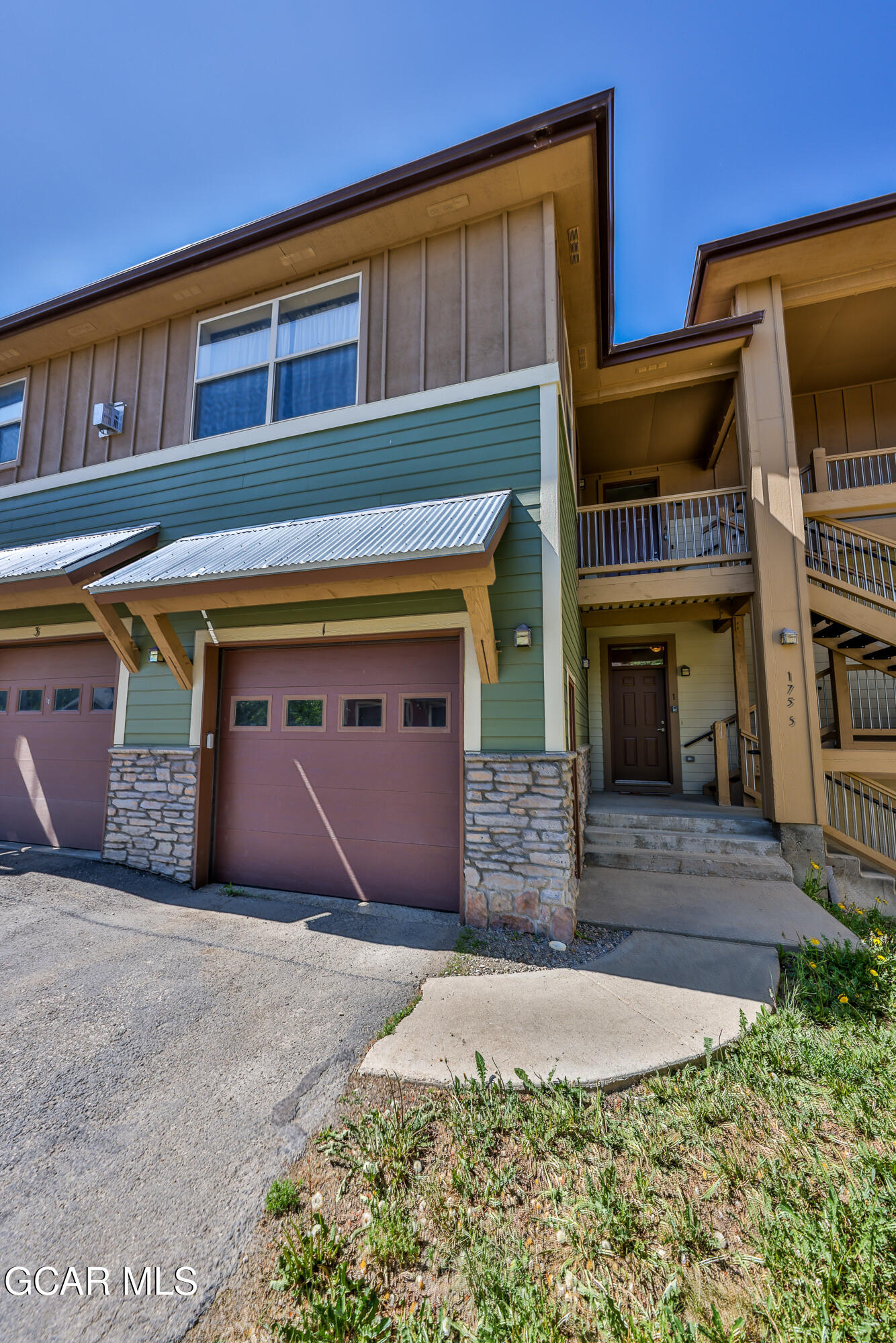 175 Gcr 8340, Unit 1 Fraser, CO 80442 - Photo 25 of 28 a front view of a house with yard