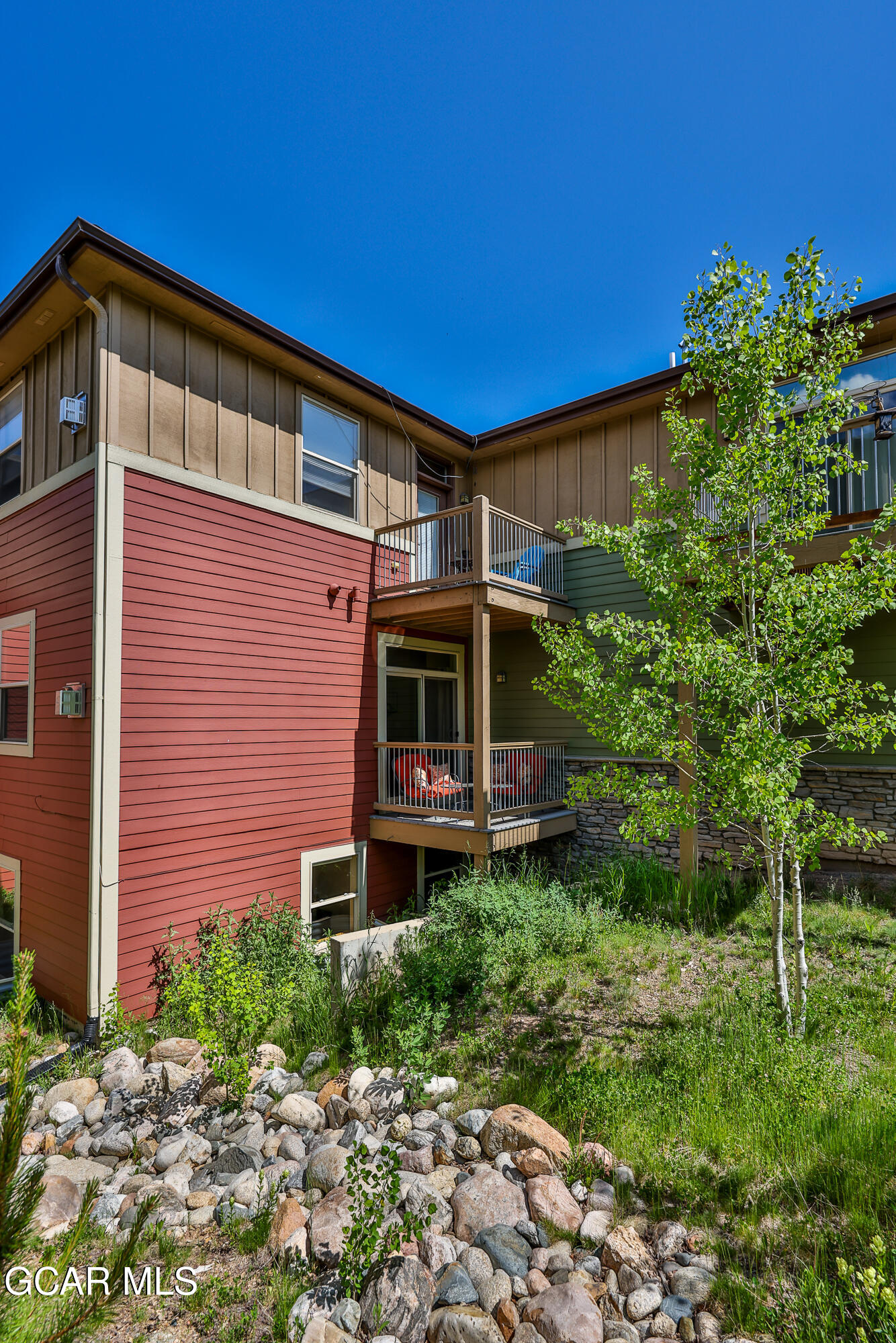 175 Gcr 8340, Unit 1 Fraser, CO 80442 - Photo 28 of 28 a front view of a house with plants