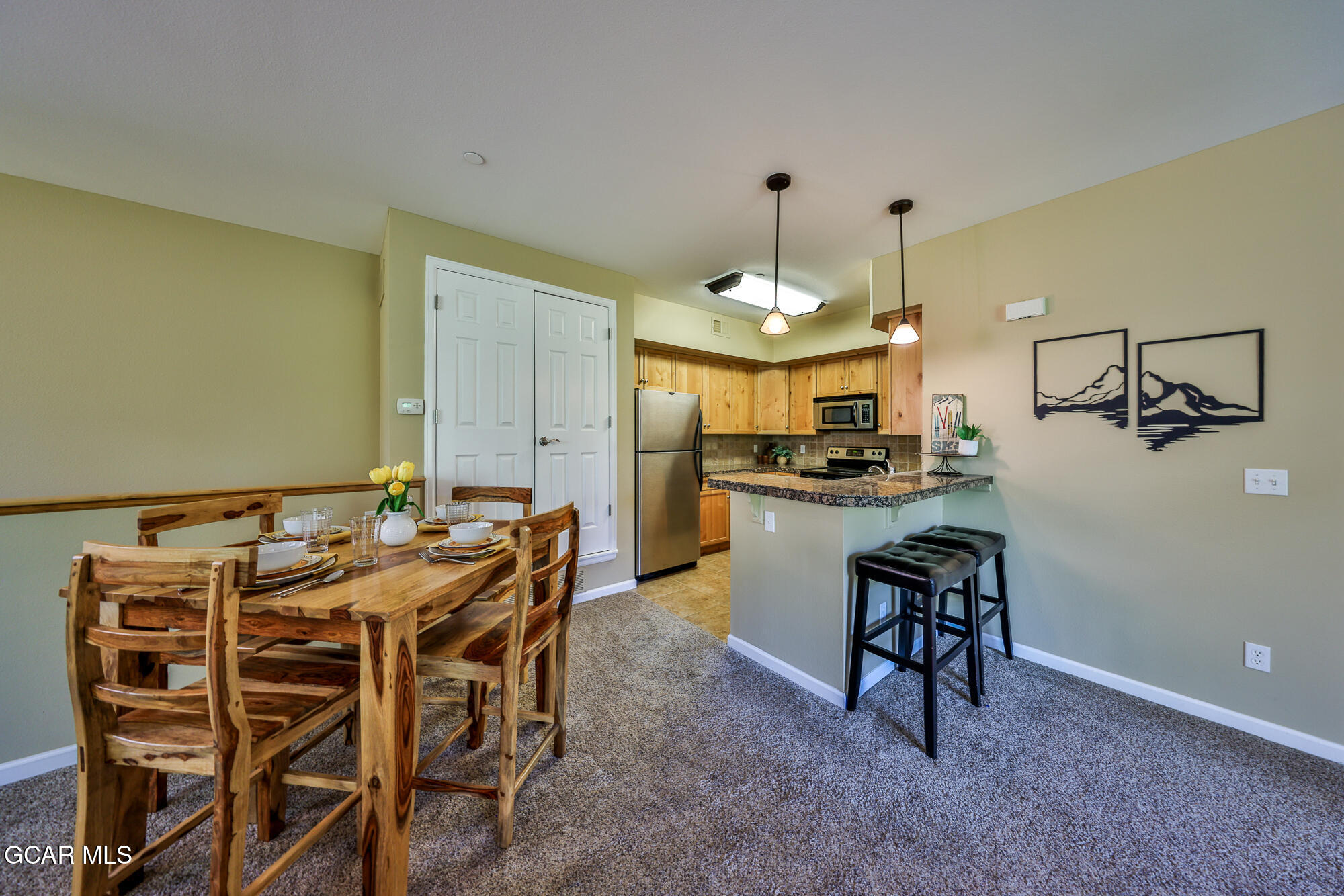 175 Gcr 8340, Unit 1 Fraser, CO 80442 - Photo 5 of 28 a view of a dining room with furniture