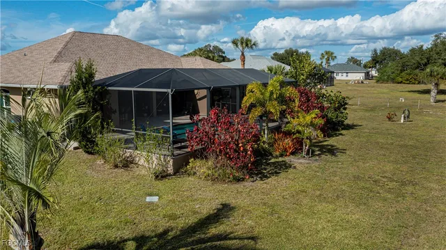 a view of a street with a building in the background
