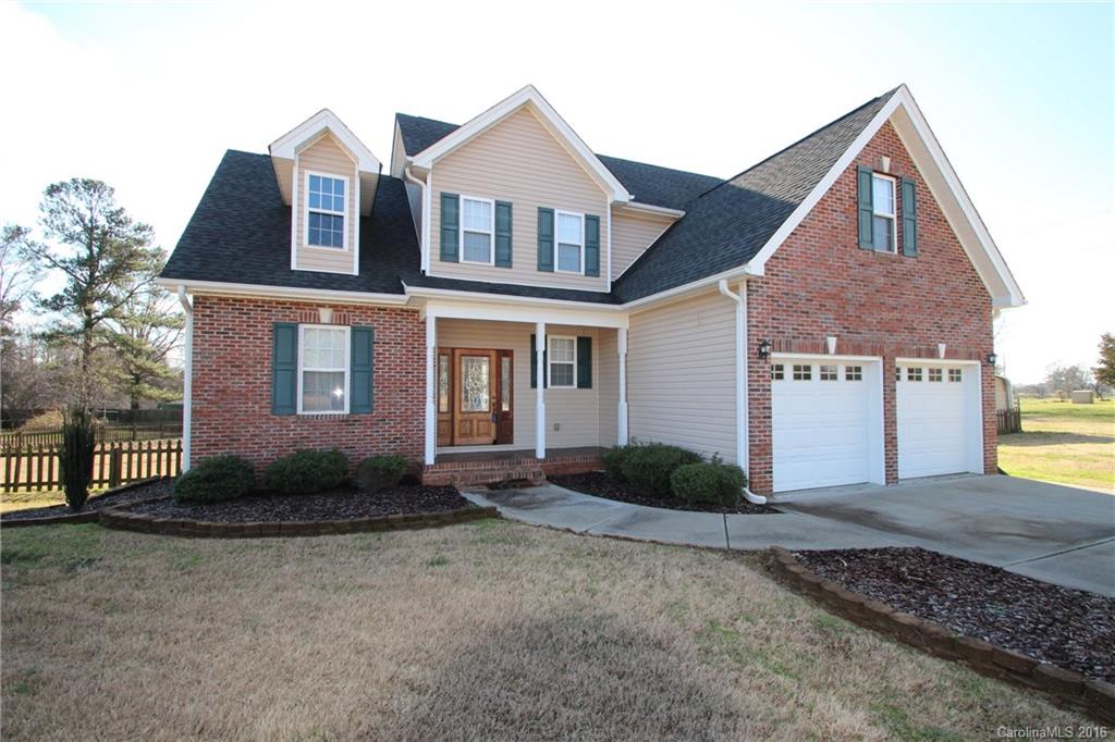 447 Maynard Grayson Road Clover, SC 29710 - Photo 2 of 19 a front view of a house with garden