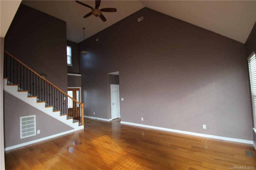 447 Maynard Grayson Road Clover, SC 29710 - Photo 11 of 19 a view of entryway and hall with wooden floor
