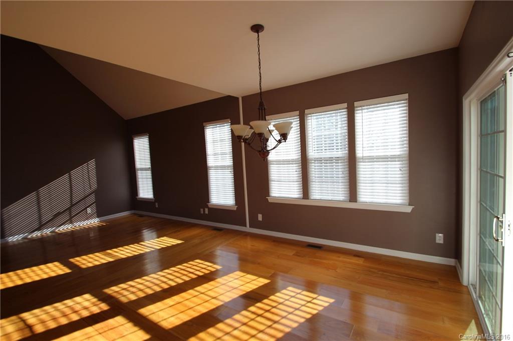 447 Maynard Grayson Road Clover, SC 29710 - Photo 10 of 19 a view of an empty room with window and chandelier