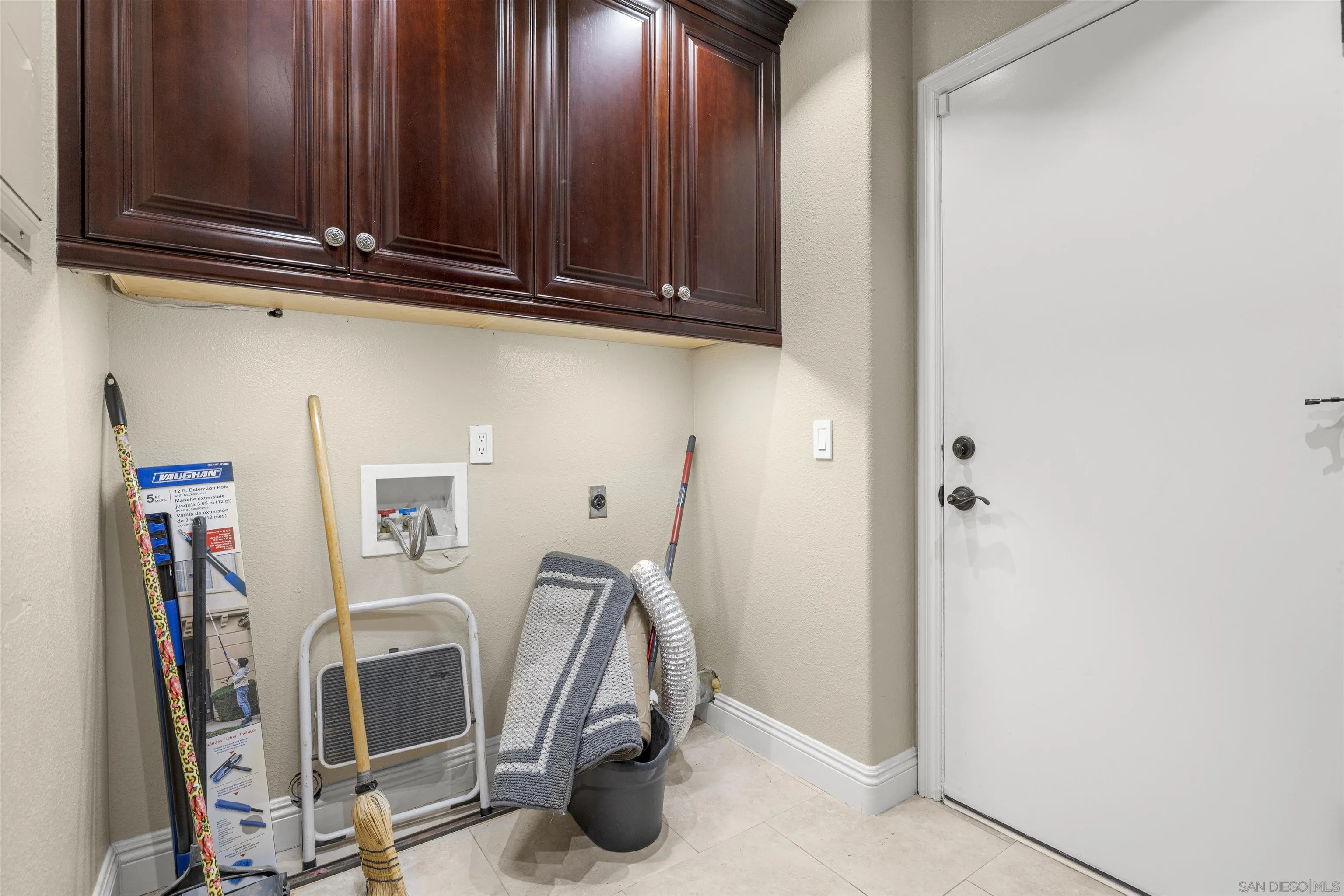 1315 Macadamia Drive Fallbrook, CA 92028 - Photo 19 of 59 a view of storage and utility room with wooden walls