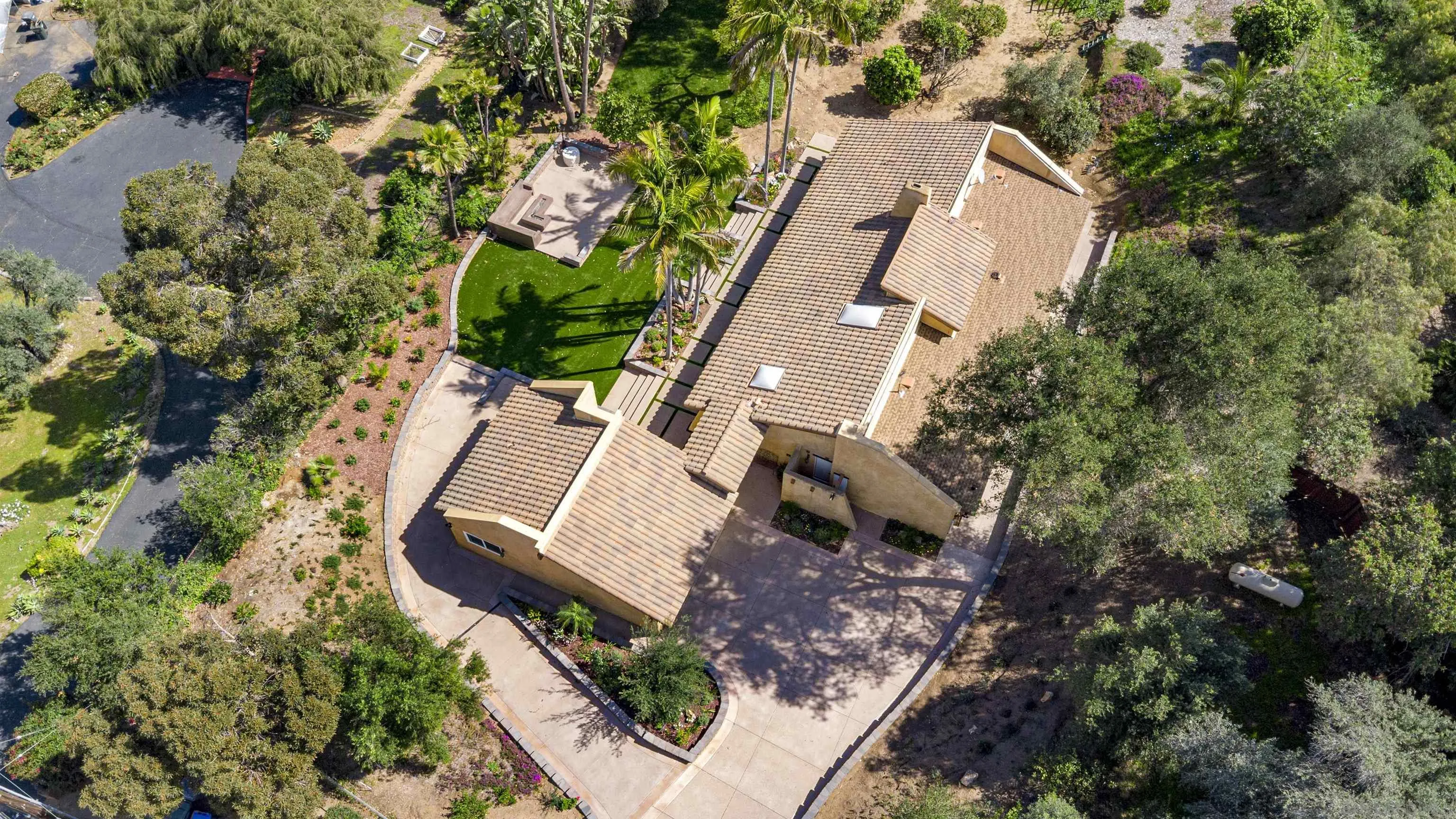 1315 Macadamia Drive Fallbrook, CA 92028 - Photo 2 of 59 an aerial view of a house with a yard