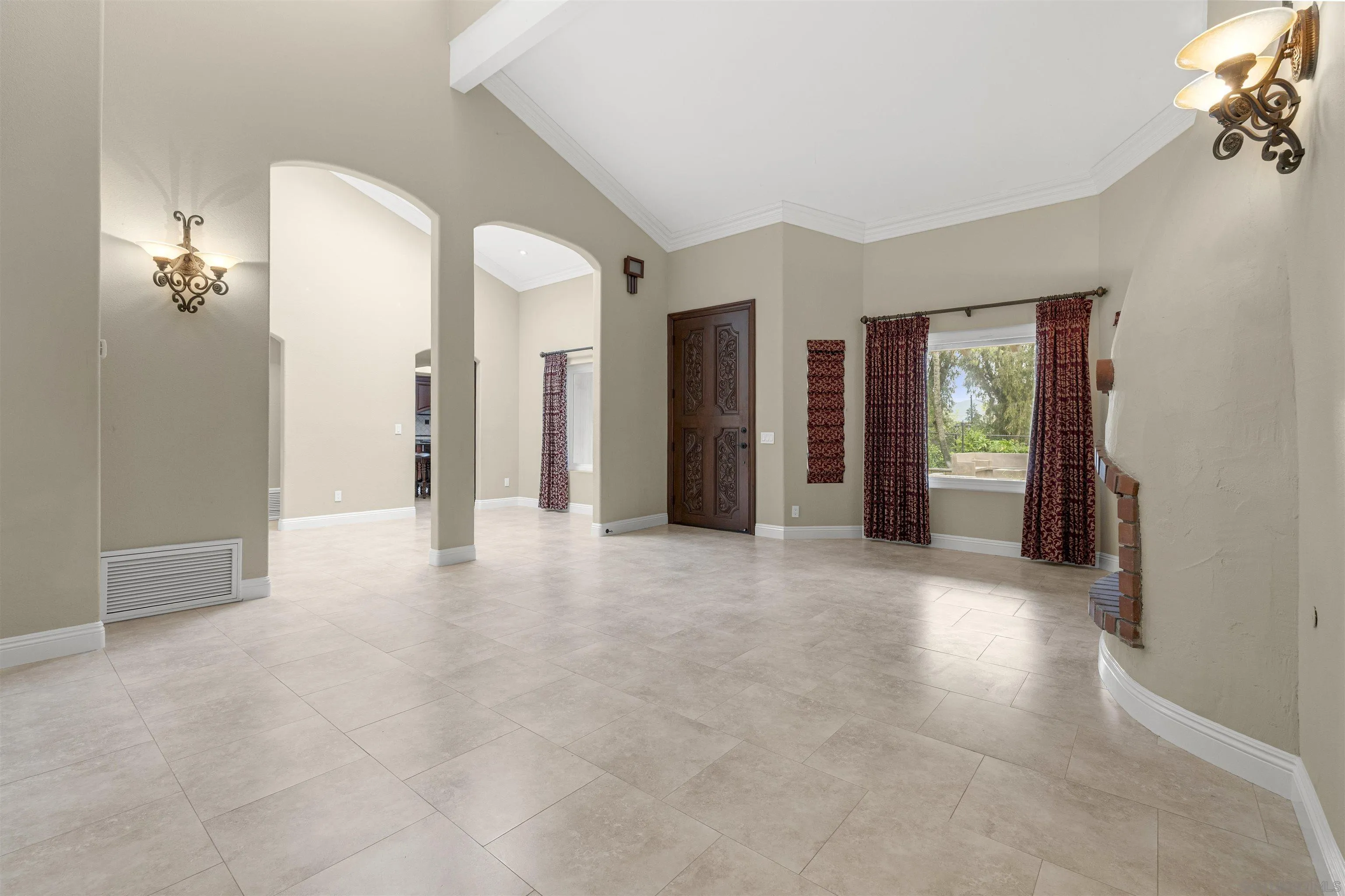 1315 Macadamia Drive Fallbrook, CA 92028 - Photo 28 of 59 a view of a big room with windows and chandelier